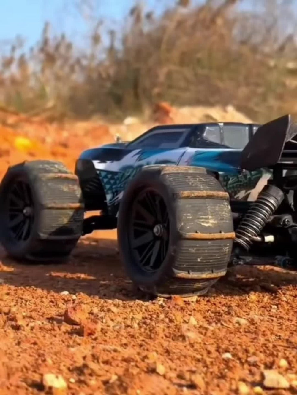 Remote Control Car, Red 4WD Monster Truck with 2.4GHz Control, Large Off-Road Tires and Four-Wheel Drive Layout