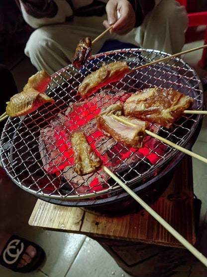 10.6-Inch Round Charcoal Grill Set with Cast-Iron Body, Cooking Grid, Wooden Base and Tongs
