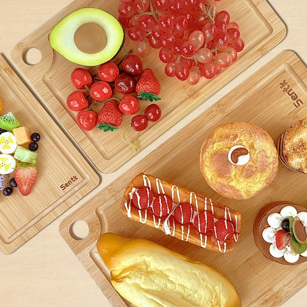 Cutting Board Three-Piece Bamboo Set with Juice Grooves, Carry Handles and Three Nested Sizes