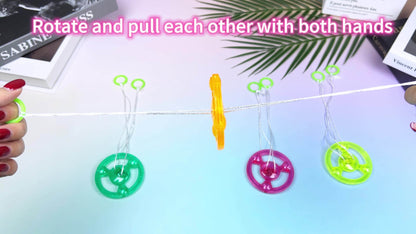 Thirty Pull-String Flywheel Spinner Toys with Four Assorted Colors and Pictured 7cm Wheel Diameter