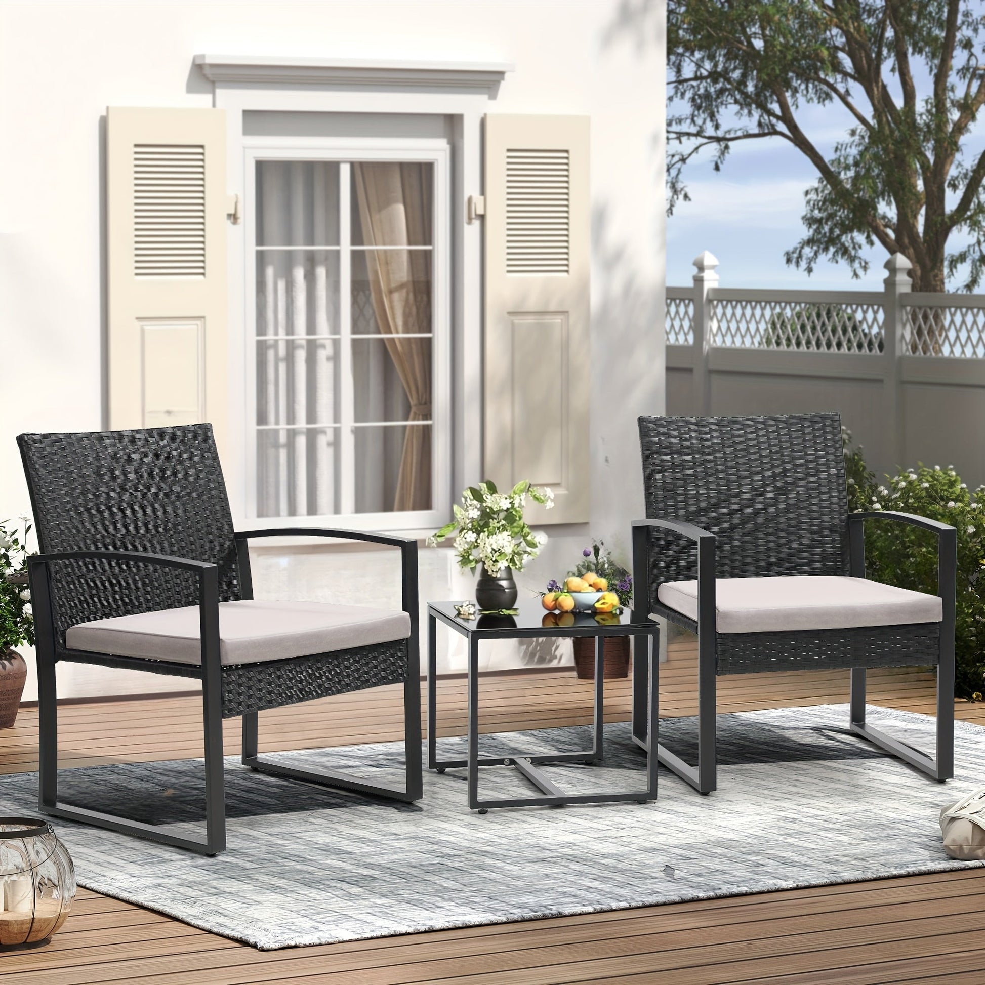 Outdoor Bistro Set shown in the Black rattan gray cushion option