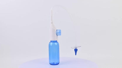Blue Manual Ear Irrigation Kit with Squeeze Bottle, Separate Catch Cup and Multiple Pictured Tip Shapes