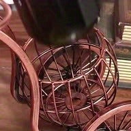 Bicycle-Shaped Tabletop Wine Rack with One Bottle Cradle and Two Stemware Holders in Copper-Tone Finish