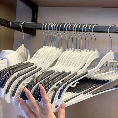 50-Piece Clothes Hanger Set with Eight Clasps, Padded Shoulder Strips and Swivel Hooks in Orange or Grey