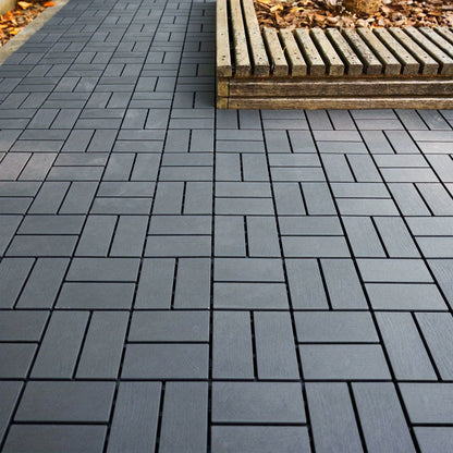 Gray 44-Piece Interlocking Deck Tile Set with 12-Inch Square Brick-Block Surface Pattern Pictured