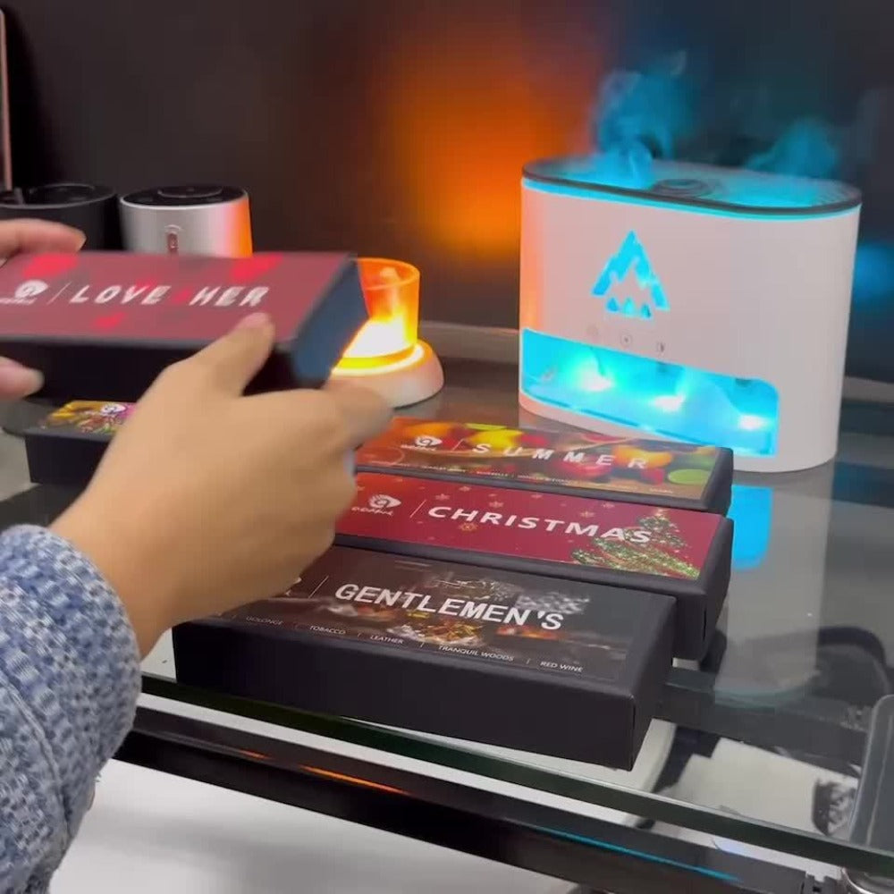 Waterless Essential Oil Diffuser with Four Mist Levels, 1–6 Hour Timer and Silver or Black Oil Bundles