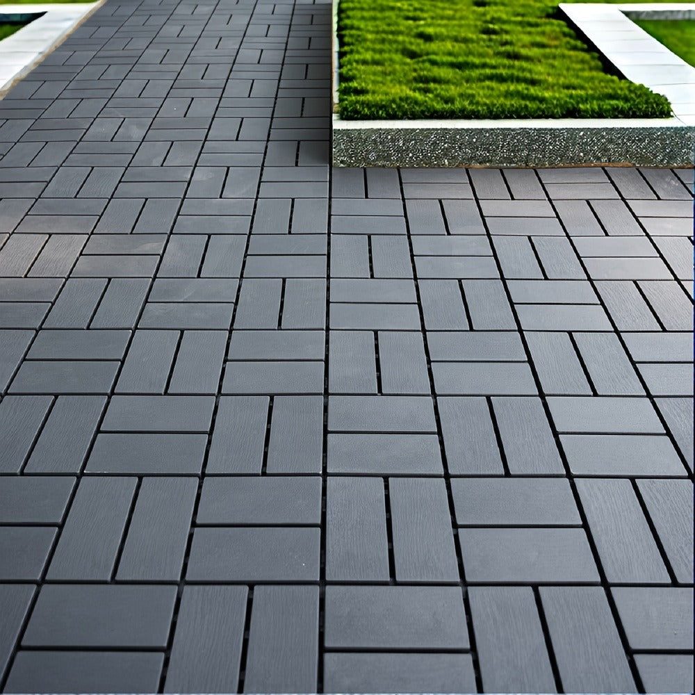 Gray 44-Piece Interlocking Deck Tile Set with 12-Inch Square Brick-Block Surface Pattern Pictured