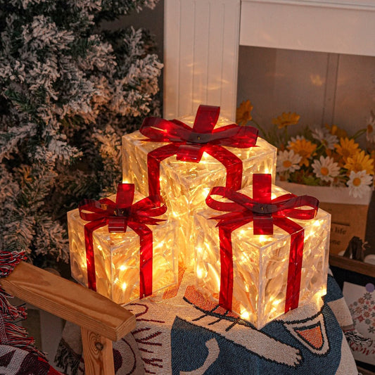 Three Warm-White Light-Up Christmas Gift Boxes with Red Bows, USB Lead and Battery Case Pictured
