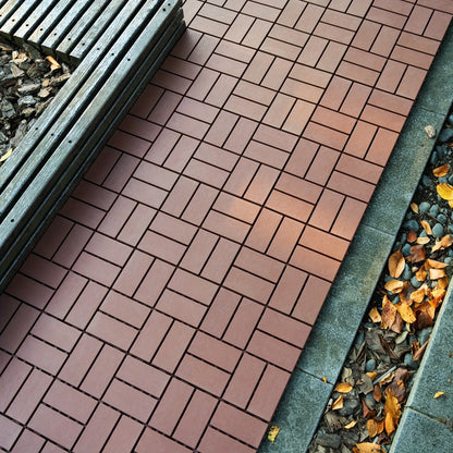 Gray 44-Piece Interlocking Deck Tile Set with 12-Inch Square Brick-Block Surface Pattern Pictured