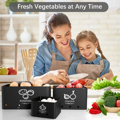Three-Piece Black Metal Canister Set Labeled for Potatoes, Onions and Garlic in Graduated Sizes