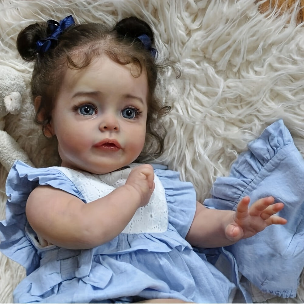 Reborn Baby Doll 48cm Soft Vinyl Toddler Design with Curly Dark Hair, Open Eyes and Blue Outfit