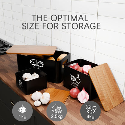 Three-Piece Black Metal Canister Set Labeled for Potatoes, Onions and Garlic in Graduated Sizes