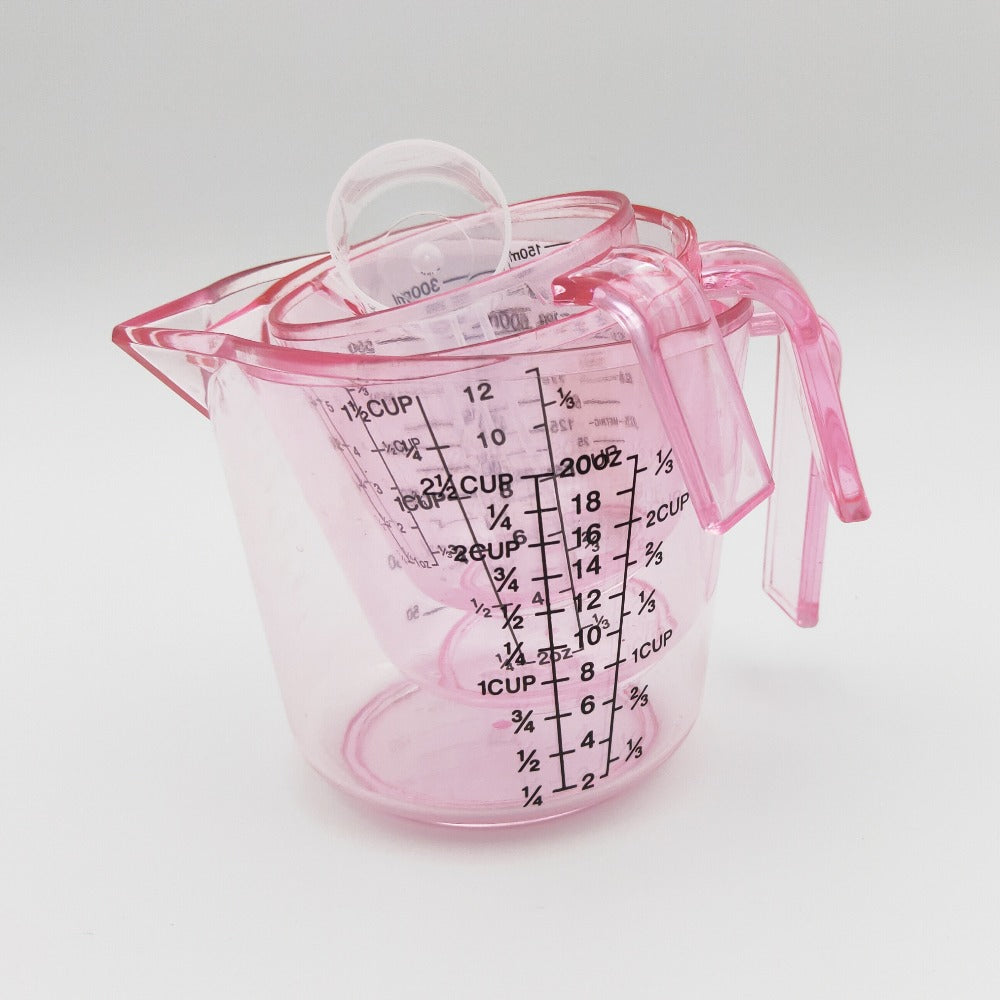 Pink Four-Piece Measuring Set with 150ml, 300ml and 600ml Cups, 20ml Spoon and Multi-Unit Markings