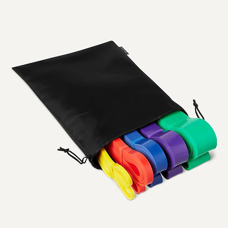 Four-Piece Mixed-Color Long Loop Resistance Band Set with Drawstring Bag and Pictured 5-125 lb Labels